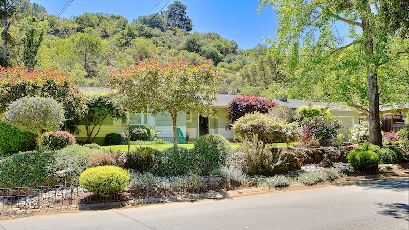 Home with lush yard in San Mateo Knolls